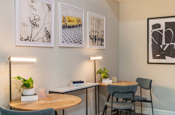 Lounge with tables and chairs.