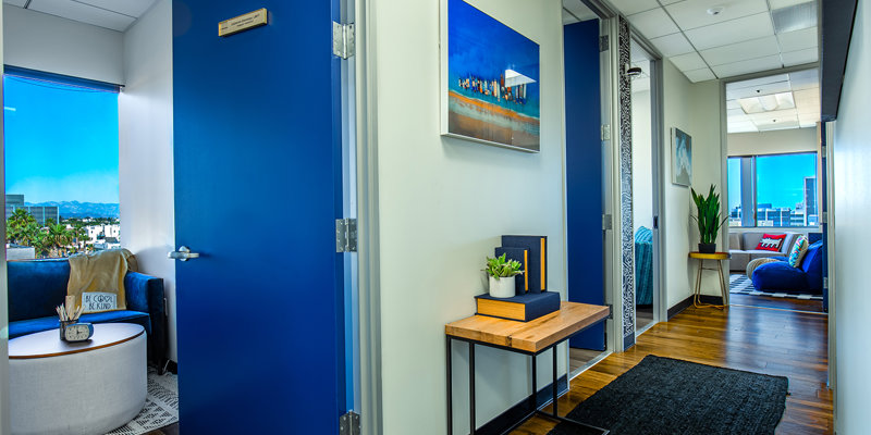 Hallway with doors to adjacent rooms.
