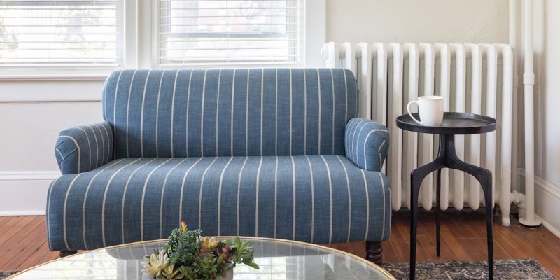 Sating area with a sofa and table.