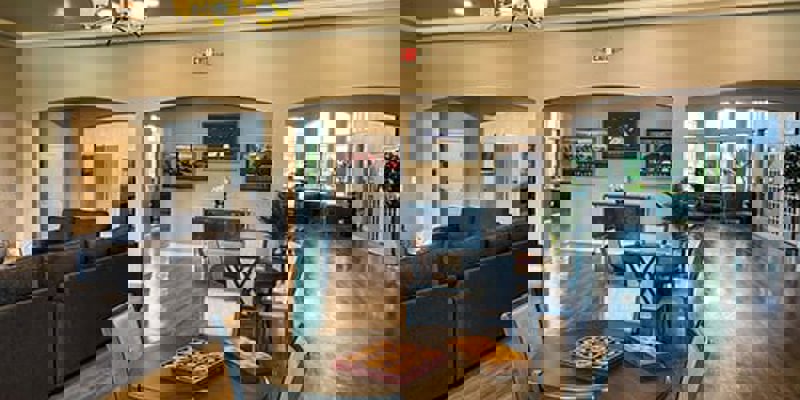 Open lobby area with sofas and tables with games.