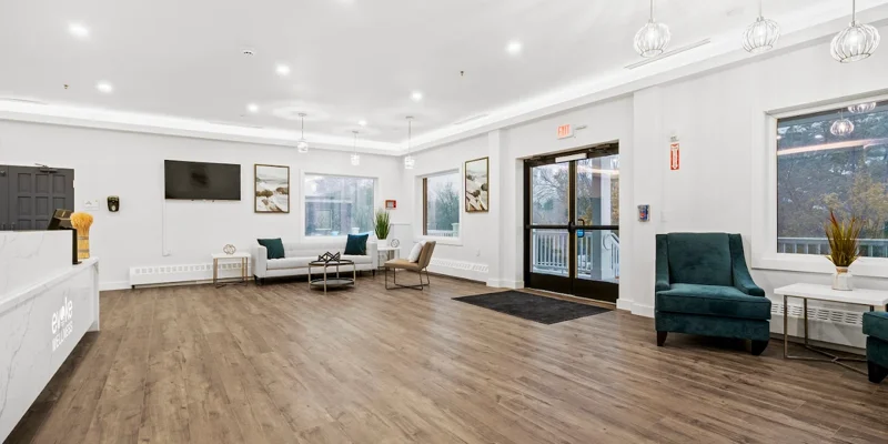Spacious, bright lobby with modern seating and large windows