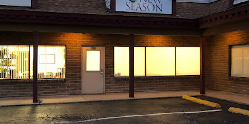 Facility exterior with signage, accessible parking and entrance.