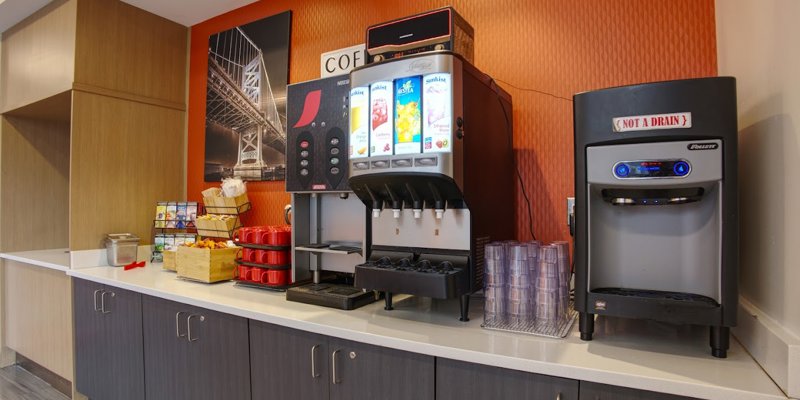 Snack bar area with machines and snacks in view.