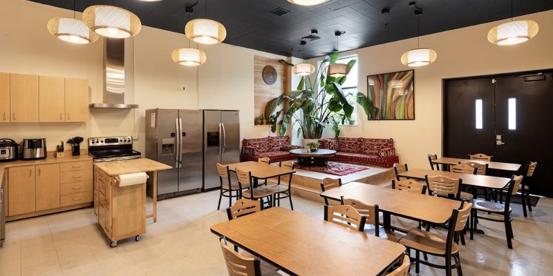 Dinning hall with shared tables and seating.