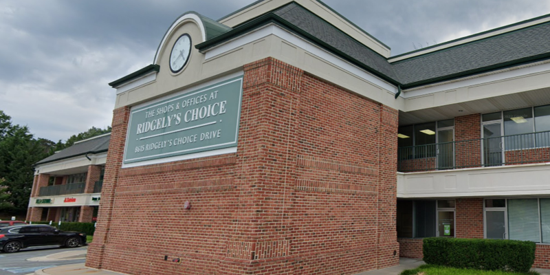 Facility exterior with signage and accessible parking.