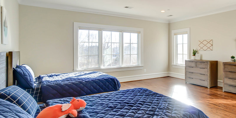 Shared bedroom with two beds.