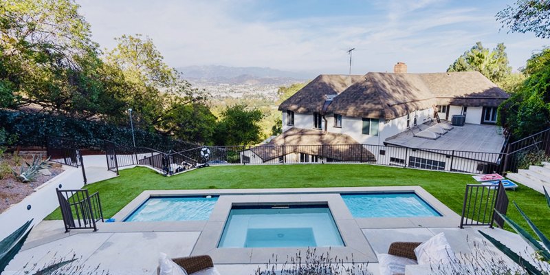 Facility backyard pool and spa.