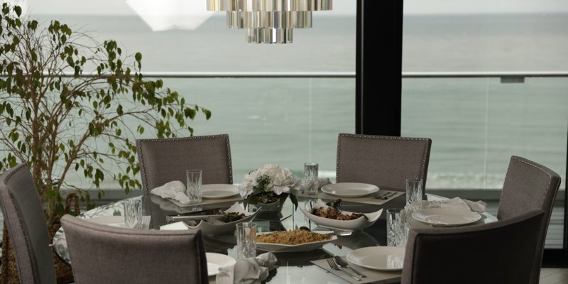 Dining setup with seating and a table.
