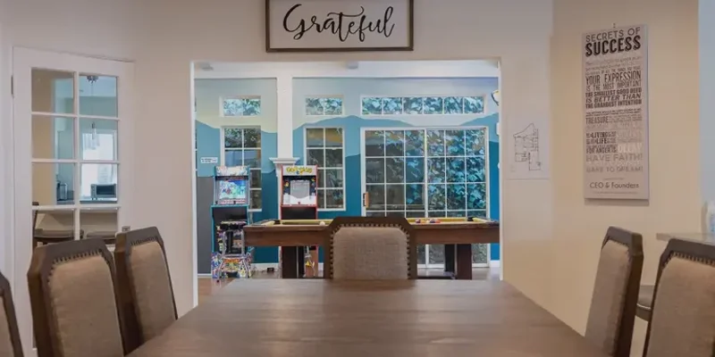 Dining area with a game room.